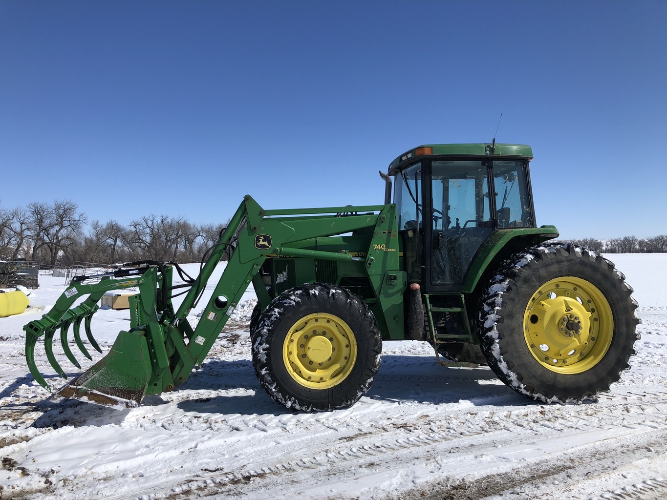 Lot 4020772 '97 JD 7410 MFWD w/JD 740 Loader. OnsiteBelle Fourche