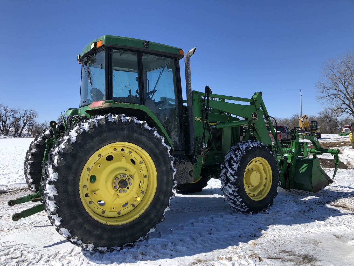 Lot 4020772 '97 JD 7410 MFWD w/JD 740 Loader. OnsiteBelle Fourche